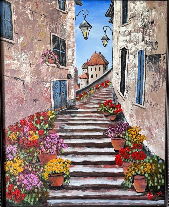 Narrow stone stairway climbing between old buildings lined with flower pots and hanging lanterns