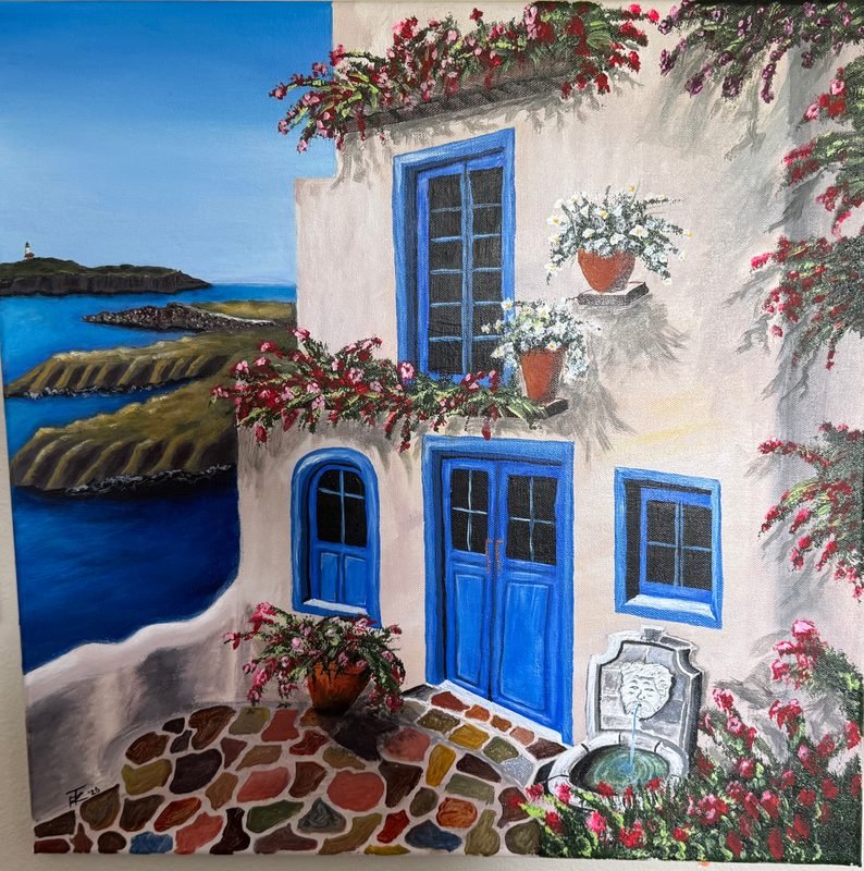 White island house with blue doors and windows, bougainvillea, and the sea beyond
