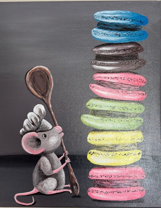 Gray mouse in a chef's hat holding a wooden spoon beside a tall stack of macarons