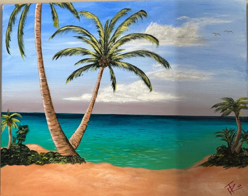 Palm trees on a sandy beach with turquoise water and white clouds